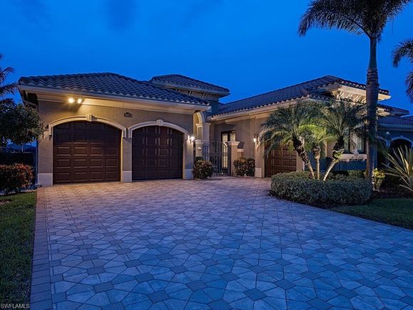 2975 Cinnamon Bay CIR NAPLES, FL House Active - Photo 1 of 35. Opens carousel modal