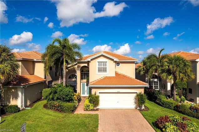1925 Isla De Palma CIR NAPLES, FL House Active - Photo 1 of 31. Opens carousel modal