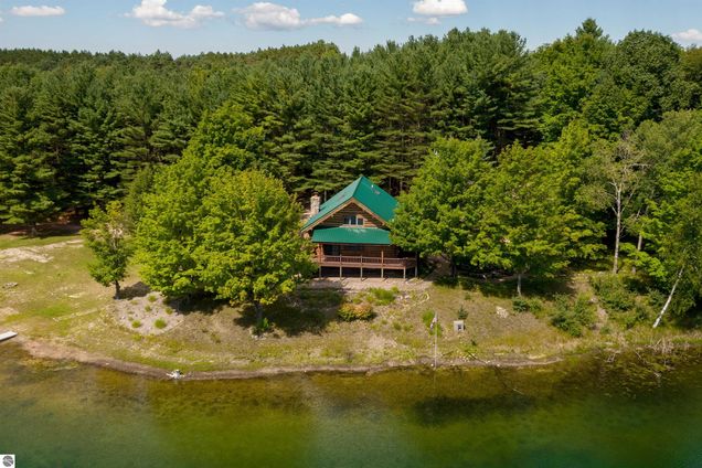 8881 Alvinas Trail Lake Ann, MI House Sold - Photo 1 of 53. Opens carousel modal