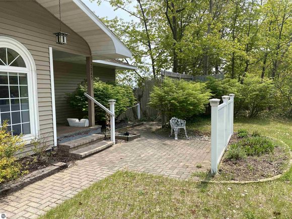 7345 S West Bay Shore Traverse City, MI House Sold - Photo 1 of 24. Opens carousel modal