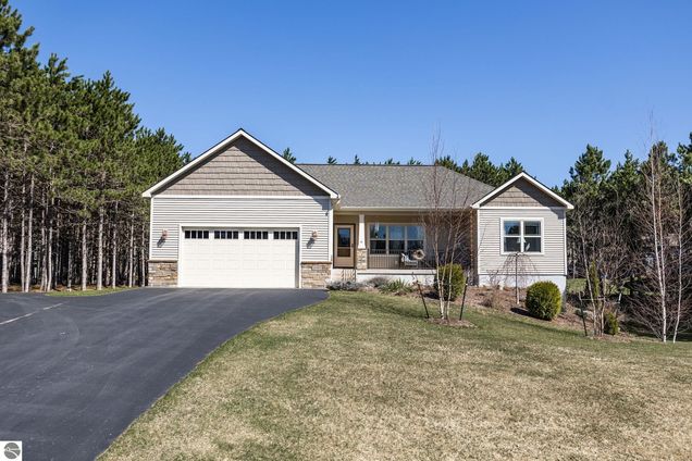 10391 Fencepost Lane Traverse City, MI House Sold - Photo 1 of 49. Opens carousel modal