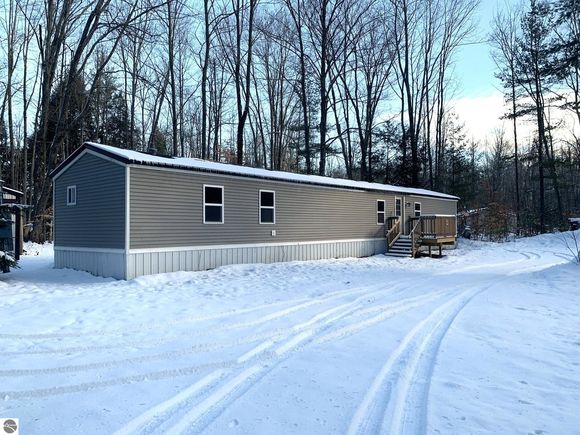 5085 Wintergreen Trail Kalkaska, MI House Sold - Photo 1 of 34. Opens carousel modal