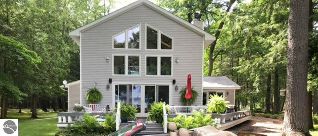 8666 Skegemog Point Road Williamsburg, MI House Sold - Photo 1 of 74. Opens carousel modal