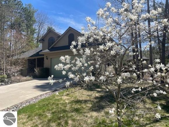 2910 Cedarwood Lane Traverse City, MI House Sold - Photo 1 of 55. Opens carousel modal