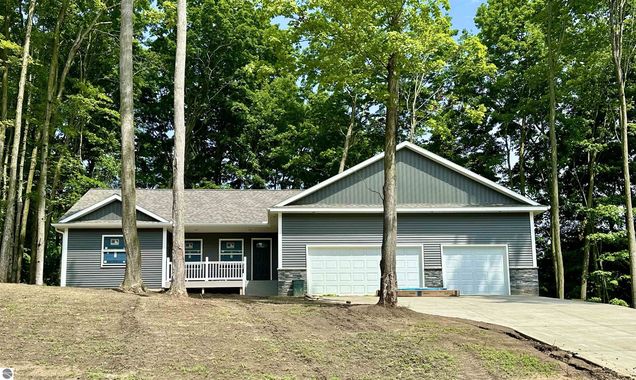 1004 Birmley Estates Drive Traverse City, MI House Active - Photo 1 of 34. Opens carousel modal