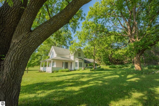 4963 S M-88 Bellaire, MI House Active - Photo 1 of 38. Opens carousel modal