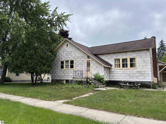 409 W State Street East Tawas, MI House Active - Photo 1 of 18. Opens carousel modal
