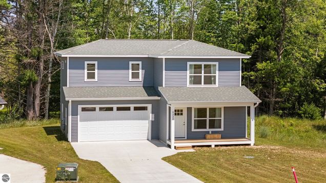 9220 S Flaska Drive Cedar, MI House Active - Photo 1 of 36. Opens carousel modal