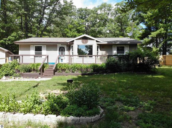2577 NW Valley Road Kalkaska, MI House Active - Photo 1 of 60. Opens carousel modal