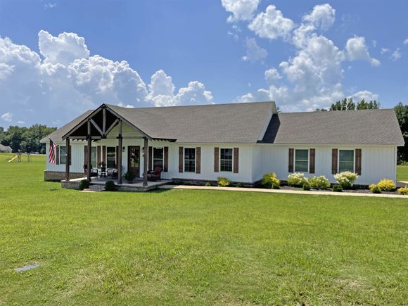 210 Charleston Ln Adamsville, TN House Active - Photo 1 of 29. Opens carousel modal
