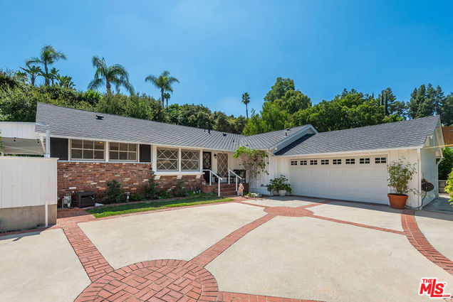 17032 Mooncrest Drive Encino, CA House Sold - Photo 1 of 22. Opens carousel modal