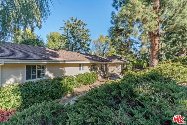 17035 Oak View Drive Encino, CA House Active - Photo 1 of 19. Opens carousel modal