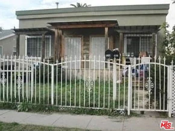 1241 S Muirfield Road Los Angeles, CA Multifamily Active - Photo 1 of 1. Opens carousel modal