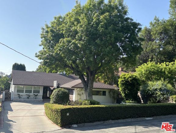 22491 Domingo Road Woodland Hills, CA House Active - Photo 1 of 63. Opens carousel modal