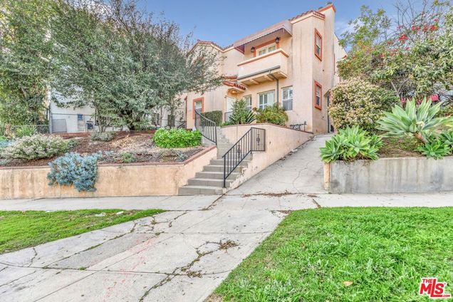 1073 S Mansfield Avenue Los Angeles, CA Multifamily Active - Photo 1 of 71. Opens carousel modal