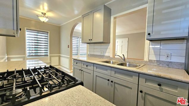 1022 S Norton Avenue Unit A Los Angeles, CA Apartment Active - Photo 1 of 31. Opens carousel modal