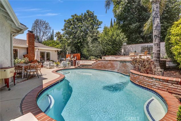 21701 Costanso Street Woodland Hills, CA House Active - Photo 1 of 34. Opens carousel modal