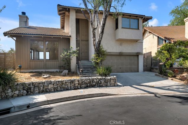 22210 Miston Drive Woodland Hills, CA House Active - Photo 1 of 34. Opens carousel modal